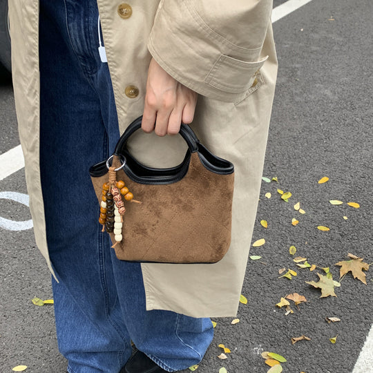 Damen elegante Handtasche mit hochwertigen Wildleder- und Lederakzenten Nord Taschen