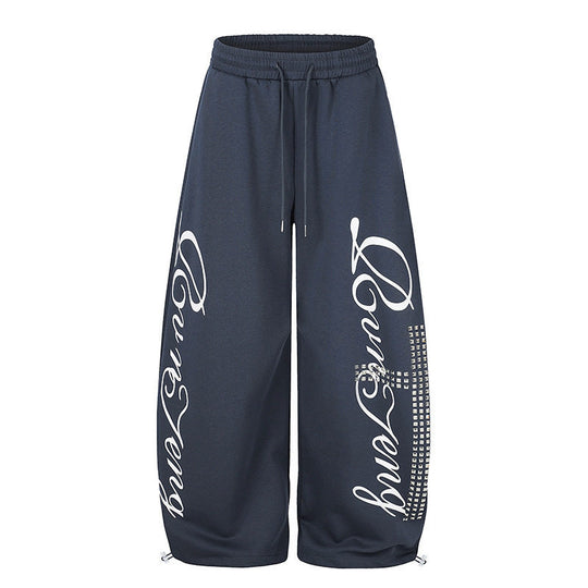 Damen Palazzo-Sweatpants im Culotte-Stil mit hohem Bund, Tunnelzug, Schriftprint und Strassbesatz Nord Taschen