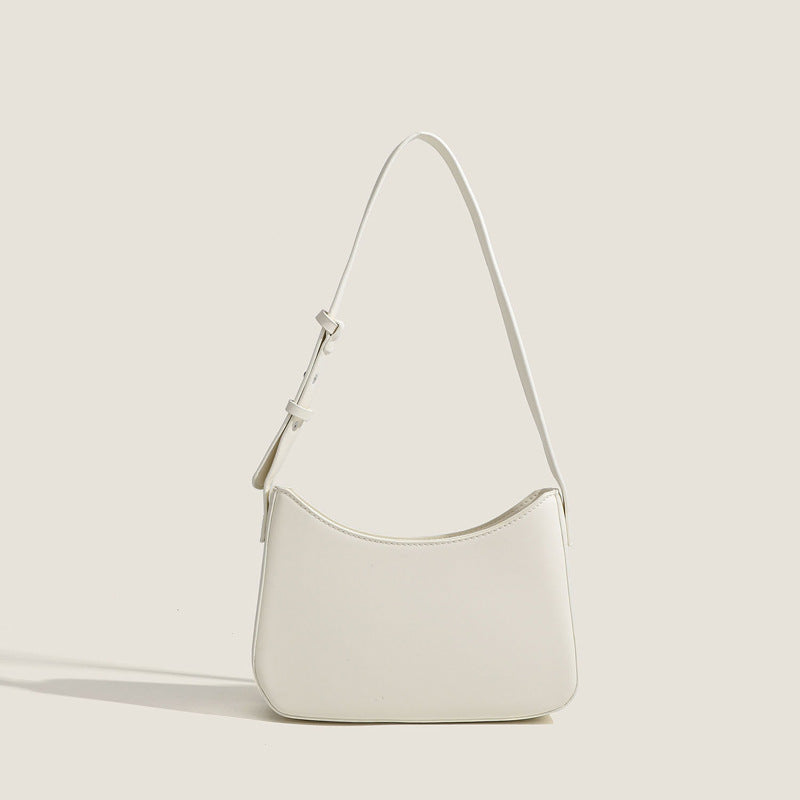 Damen Schultertasche mit geschwungener Silhouette und stylischem Gurt Nord Taschen