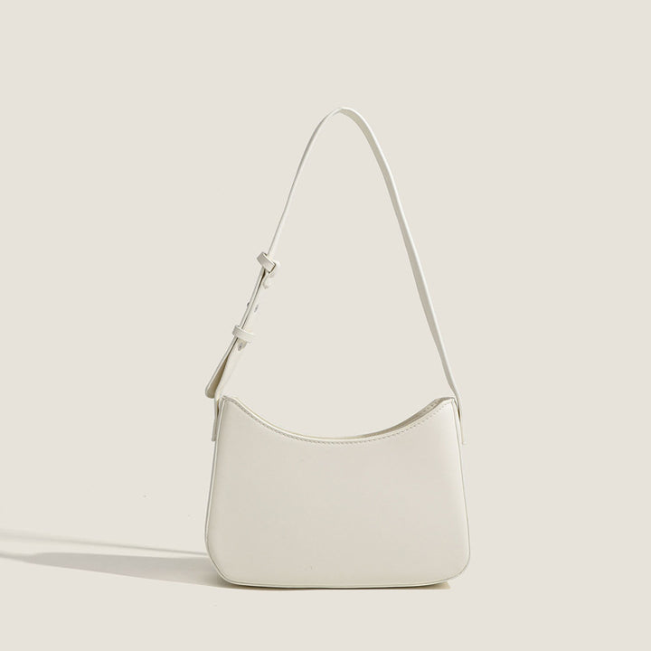 Damen Schultertasche mit geschwungener Silhouette und stylischem Gurt Nord Taschen