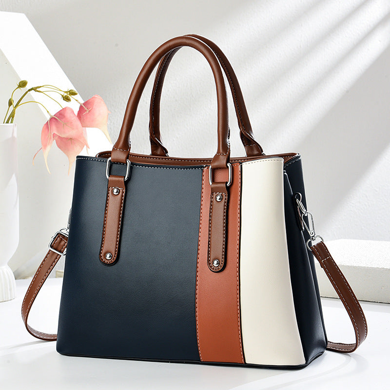 Damen Handtasche mit eleganten Farbakzenten und vielseitigem Tragegurt Nord Taschen