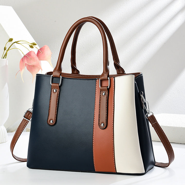 Damen Handtasche mit eleganten Farbakzenten und vielseitigem Tragegurt Nord Taschen