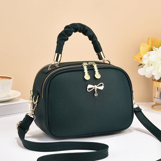 Damen Handtasche mit geflochtenem Tragegriff und edlem Zipper Nord Taschen