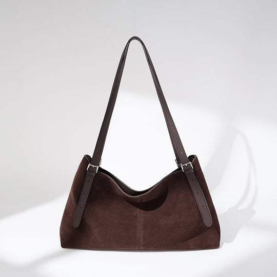 Damen Umhängetasche aus weichem Wildleder mit eleganten Akzenten Nord Taschen