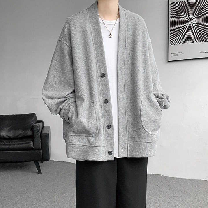 Herren oversized Strickcardigan mit V-Ausschnitt, aufgesetzten Rundtaschen und lässiger Drop-Shoulder-Silhouette Nord Taschen