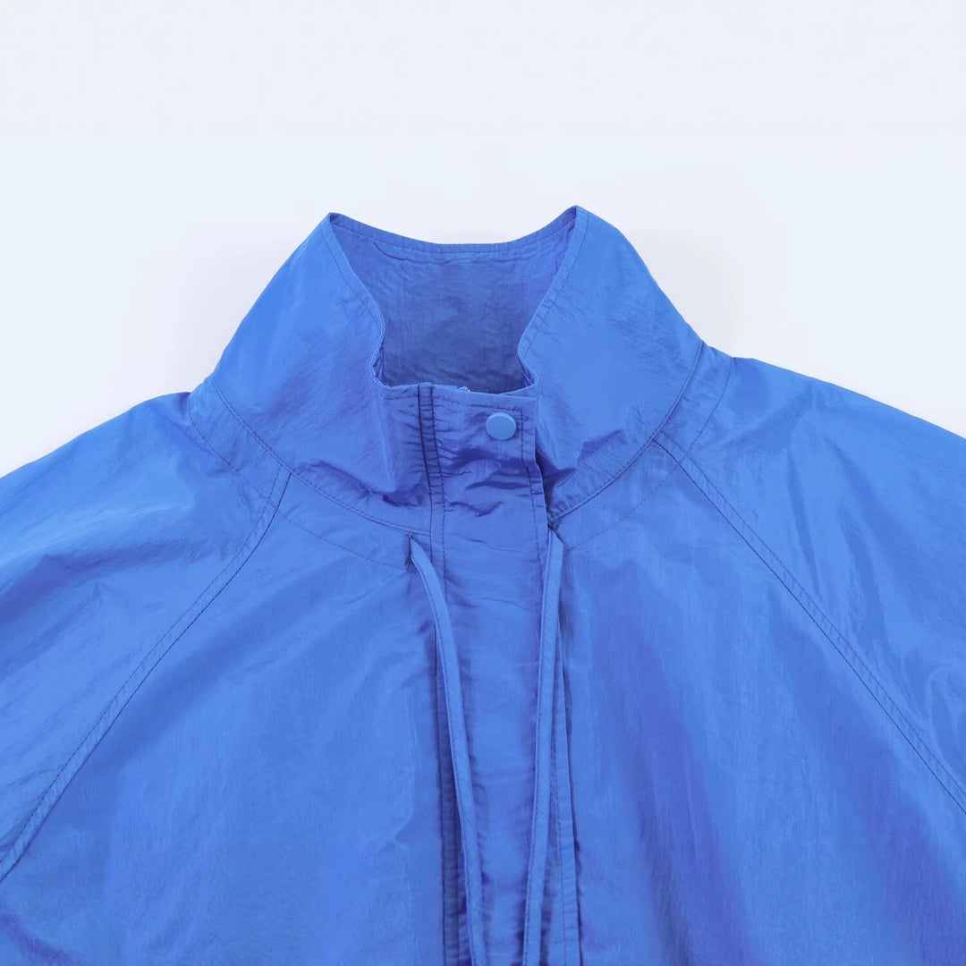 Damen Leichte Windbreakerjacke mit hohem Stehkragen, Tunnelzugsaum und Raglanärmeln Nord Taschen