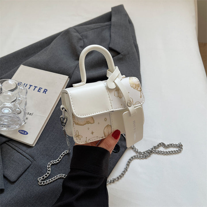 Damen elegante Umhängetasche mit floralem Design und modischen Akzenten Nord Taschen
