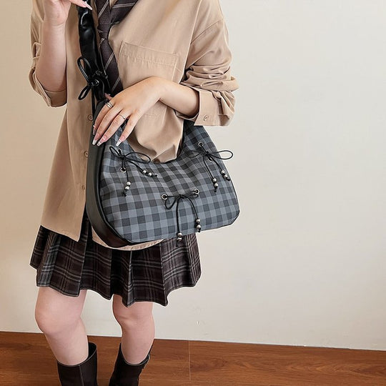 Damen Hobo-Tasche mit dekorativem Kordelzug und glänzenden Akzenten Nord Taschen