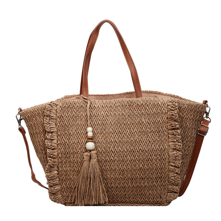 Damenhandtasche aus gewebtem Naturmaterial mit fransenartiger Dekoration Nord Taschen