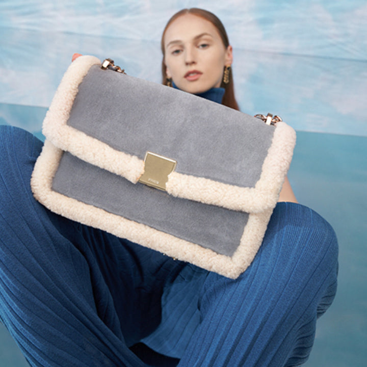 Damen schicke Handtasche aus Wildleder mit Wollbesatz Nord Taschen
