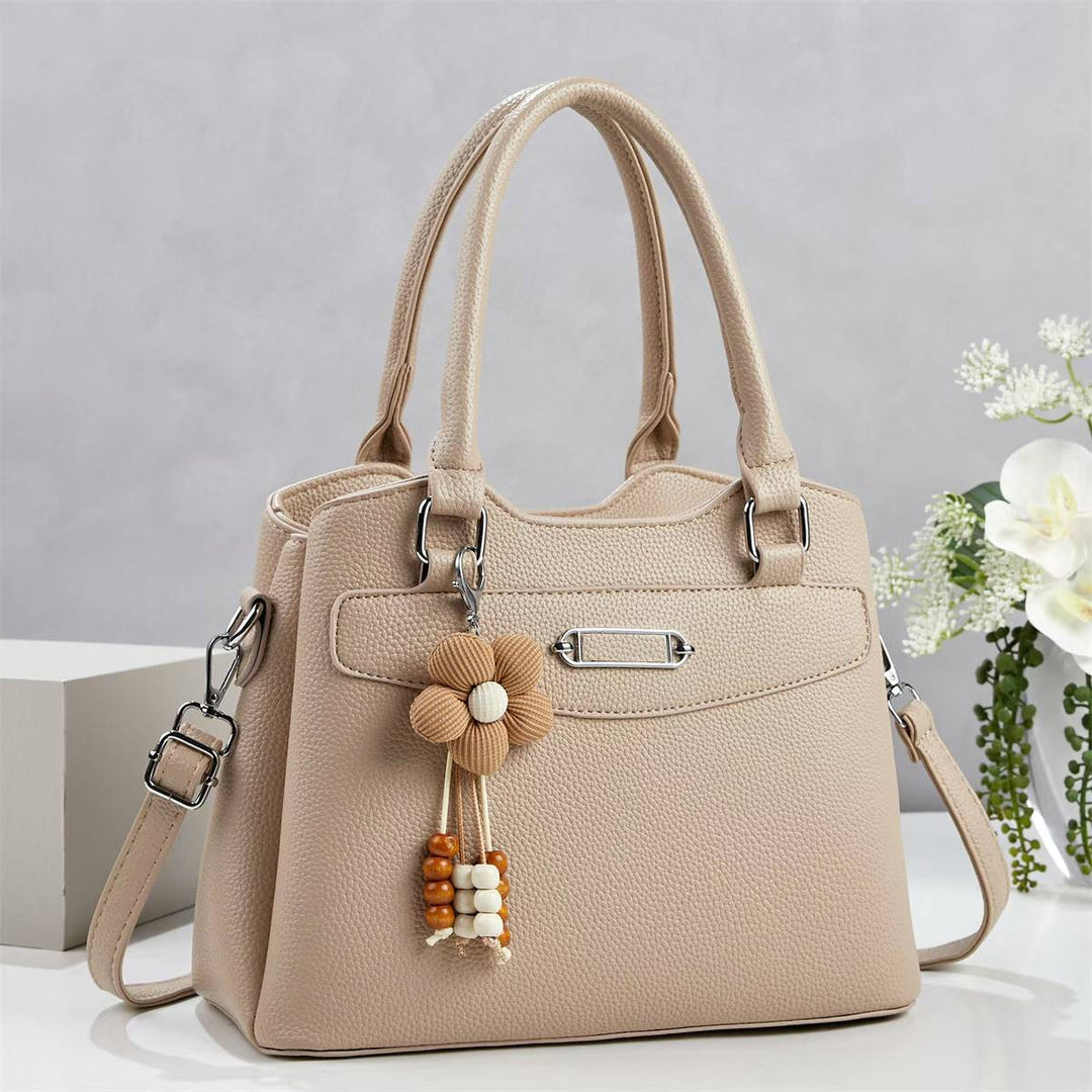 Damen elegante Handtasche mit abnehmbarem Blumen-Anhänger Nord Taschen