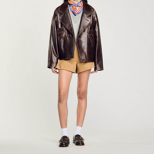 Damen Kurz geschnittene Oversize-Lederjacke mit Rundkragen und Pattentaschen Nord Taschen