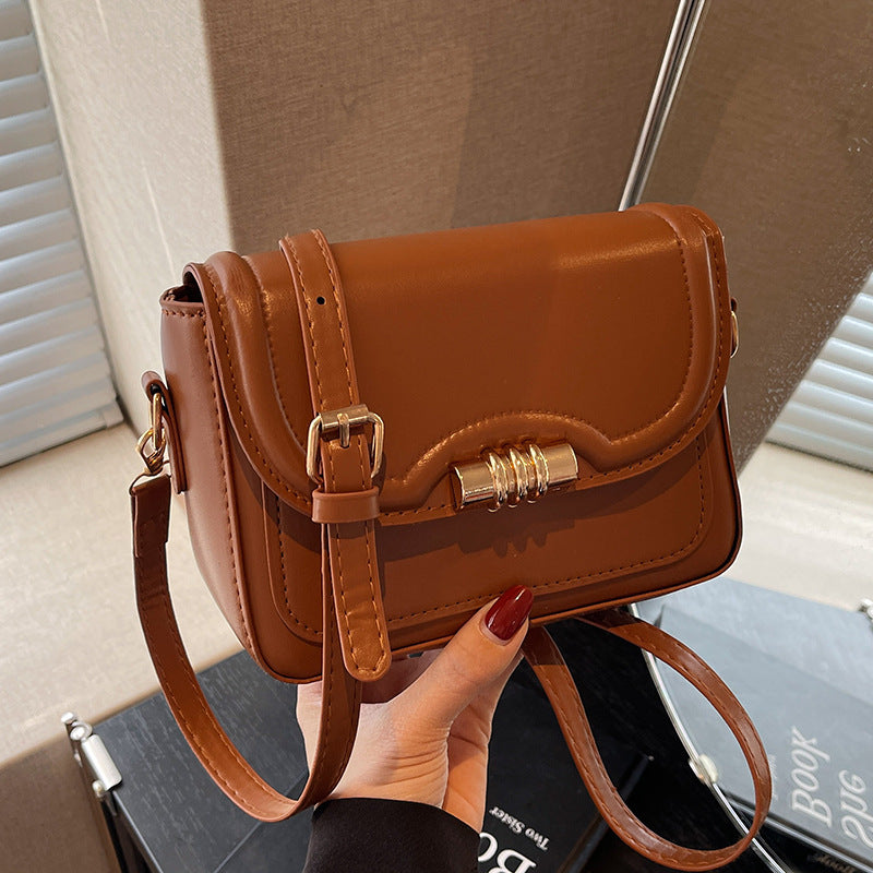 Damen elegante Umhängetasche mit strukturiertem Design und goldfarbenem Verschluss Nord Taschen