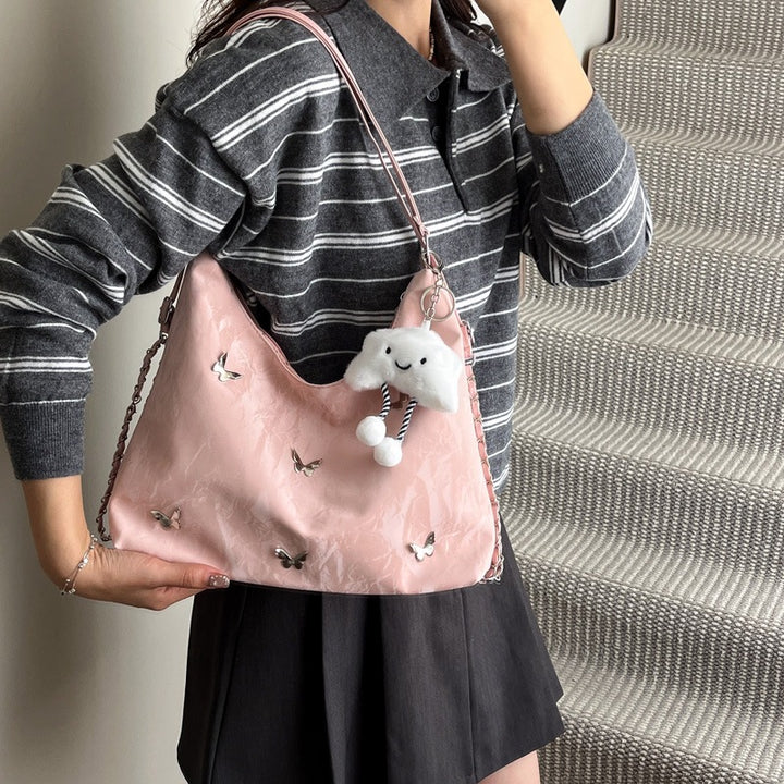 Damen modische Hobo-Tasche mit verspieltem Anhänger und detailreicher Verzierung Nord Taschen