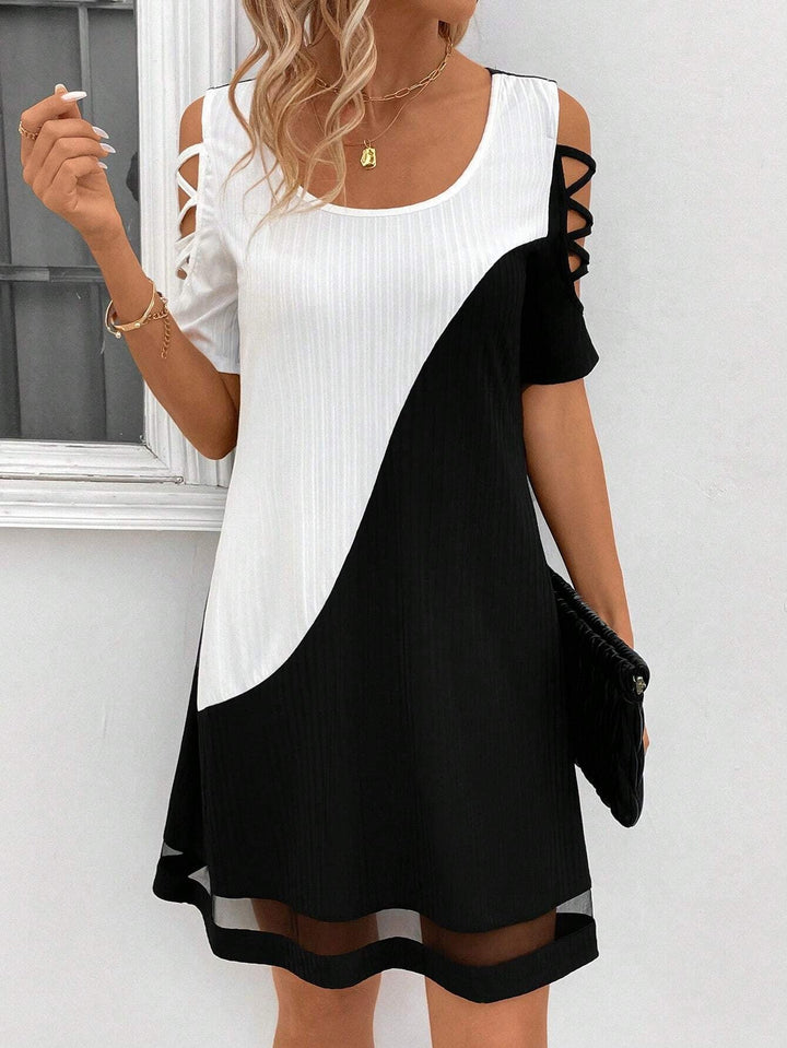 Damen modisches Freizeitkleid mit Cut-Out Ärmeln und asymmetrischem Design
