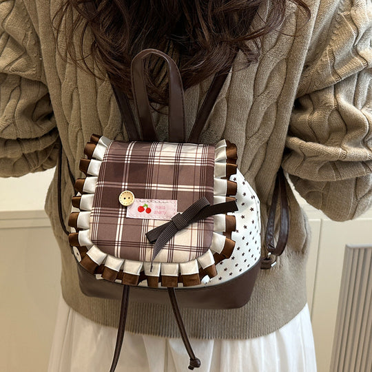 Damen Rucksack mit kreativem Karomuster und verspielten Details Nord Taschen