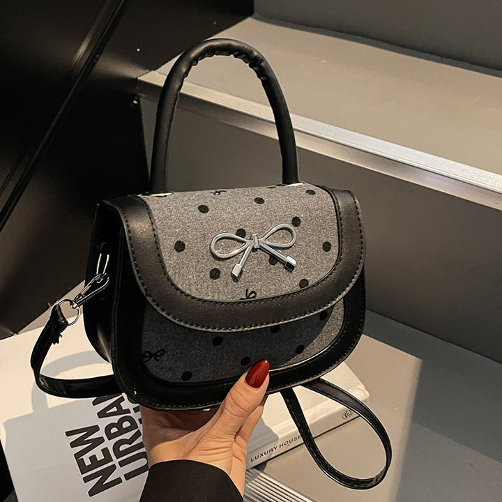 Damen modische Handtasche mit verspieltem Punktedesign und praktischen Fächern Nord Taschen
