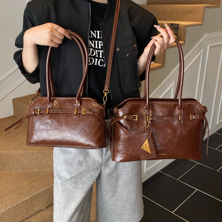 Damen elegante Schultertasche mit einzigartigem Goldakzent Nord Taschen