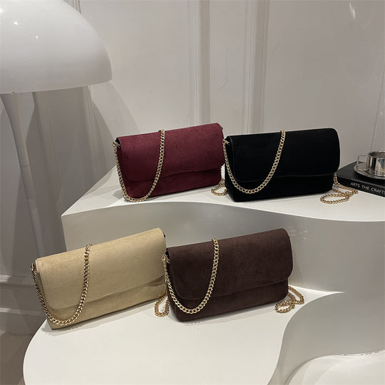 Damen Clutch Tasche mit edlem Kettenakzent Nord Taschen
