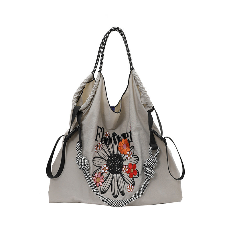 Damen Umhängetasche mit floralem Design und praktischem Zugverschluss Nord Taschen