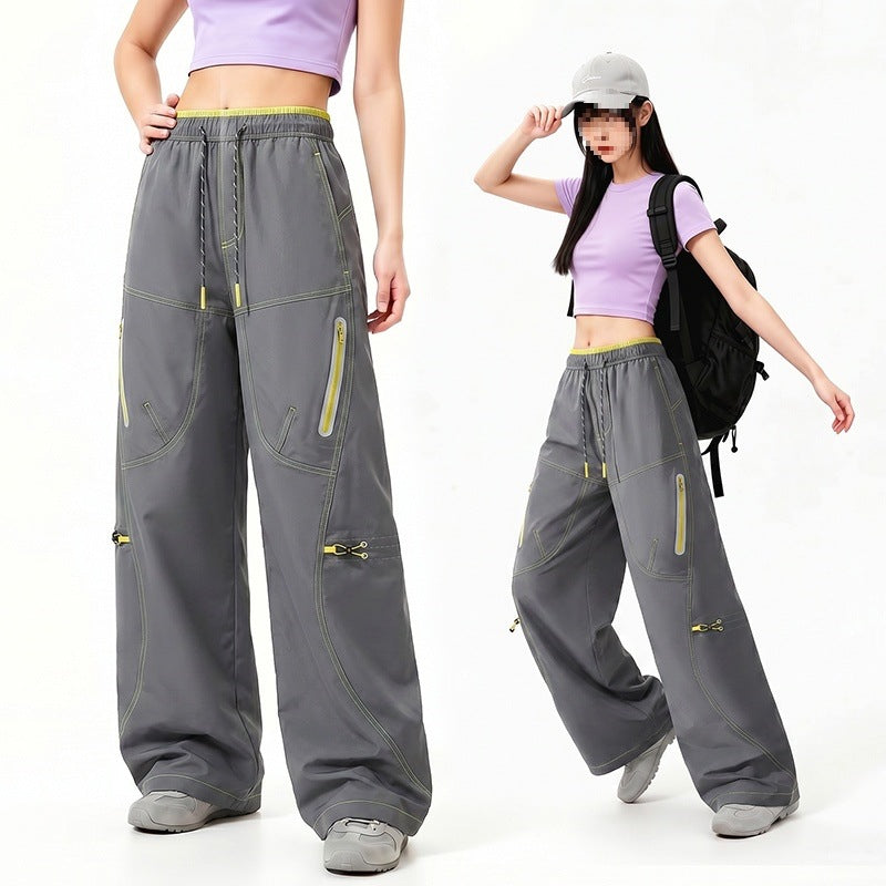 Damen Oversize Tech-Loungehose mit Kontrastnähten, reflektierenden Reißverschlusstaschen & Kordelbund Nord Taschen
