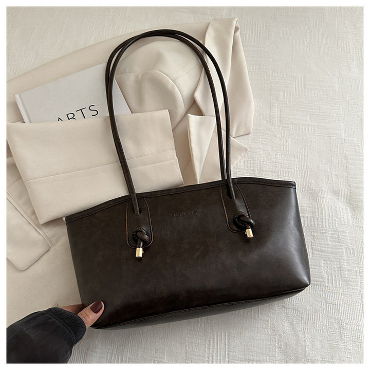 Damen Handtasche im minimalistischen Design mit edlen Akzenten Nord Taschen