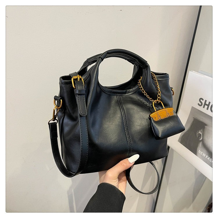 Damen elegante Handtasche mit abnehmbarem Charm Nord Taschen