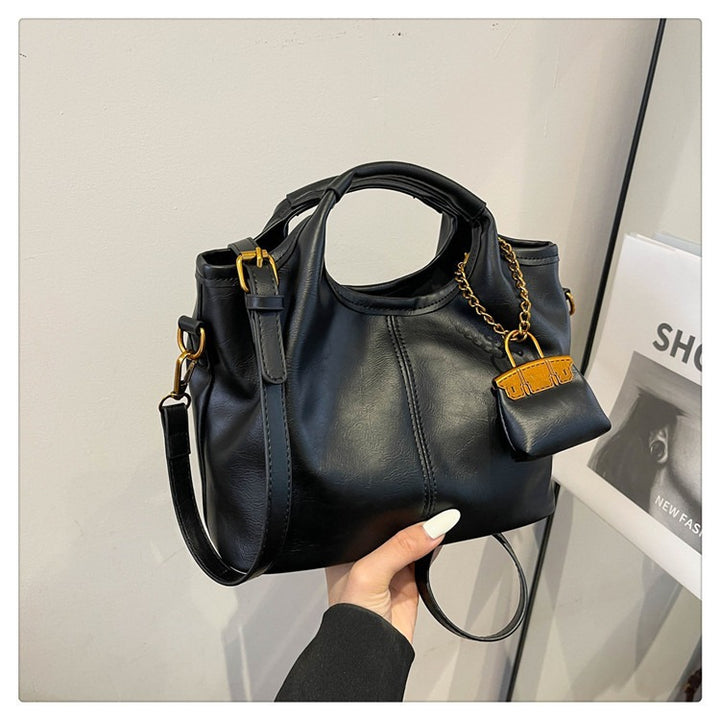 Damen elegante Handtasche mit abnehmbarem Charm Nord Taschen