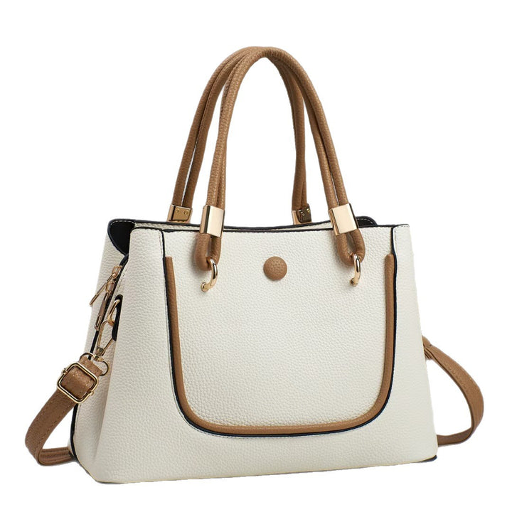 Damen Handtasche mit goldenen Akzenten und eleganter Struktur Nord Taschen