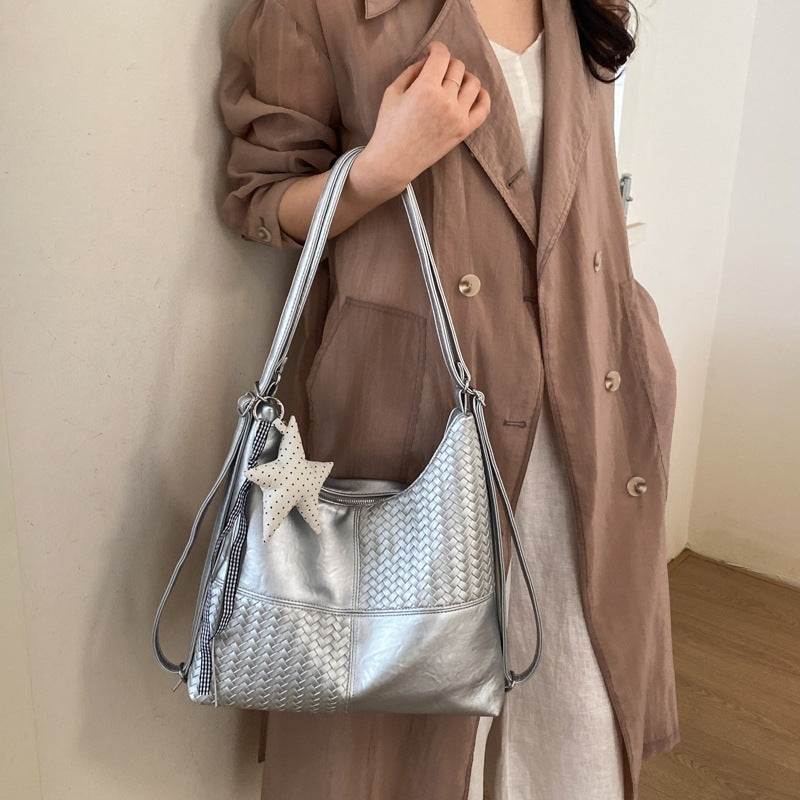 Damen Beuteltasche aus kunstvoll geflochtenem Leder mit elegantem Design Nord Taschen
