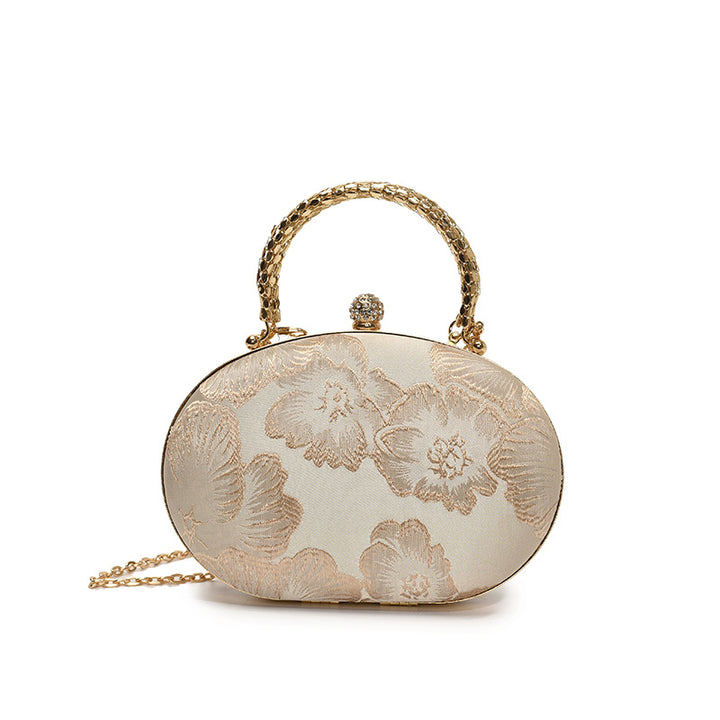 Damen Clutch mit floralem Muster und goldenen Akzenten Nord Taschen