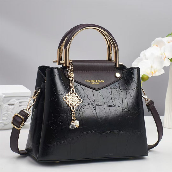 Damen elegante Handtasche mit goldenen Akzenten Nord Taschen