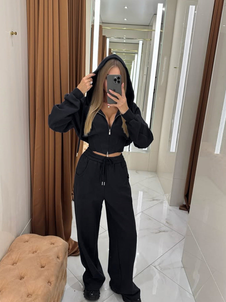 Damen tailliertes Kurzzip-Hoodie mit Statement-Ärmeln und weiter High-Waist Palazzo-Hose Nord Taschen