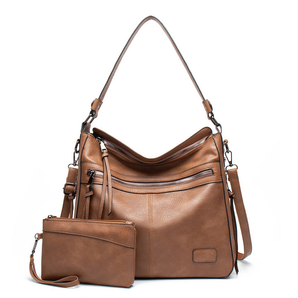Damen Hobo-Tasche mit abnehmbarem Kosmetiktäschchen und eleganten Reißverschlussfächern Nord Taschen