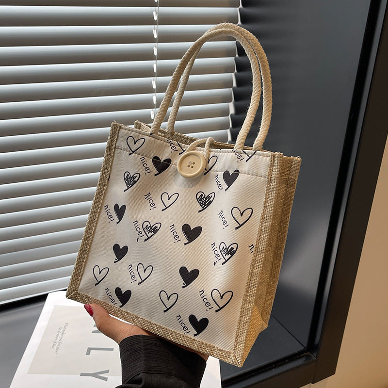 Damen Jute-Tragetasche mit verspieltem Herzdesign und Buttonverschluss Nord Taschen