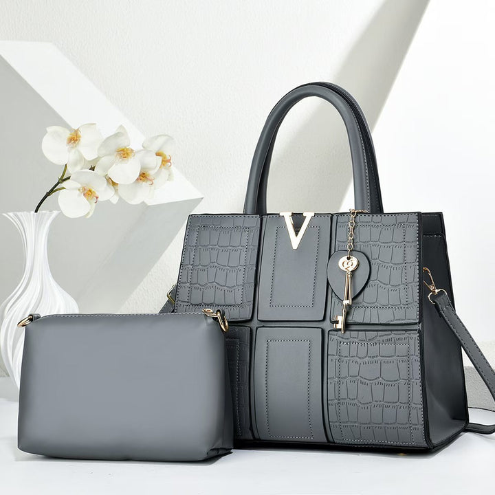 Damen Handtasche mit eleganter Kroko-Prägung und abnehmbarer Kosmetiktasche Nord Taschen