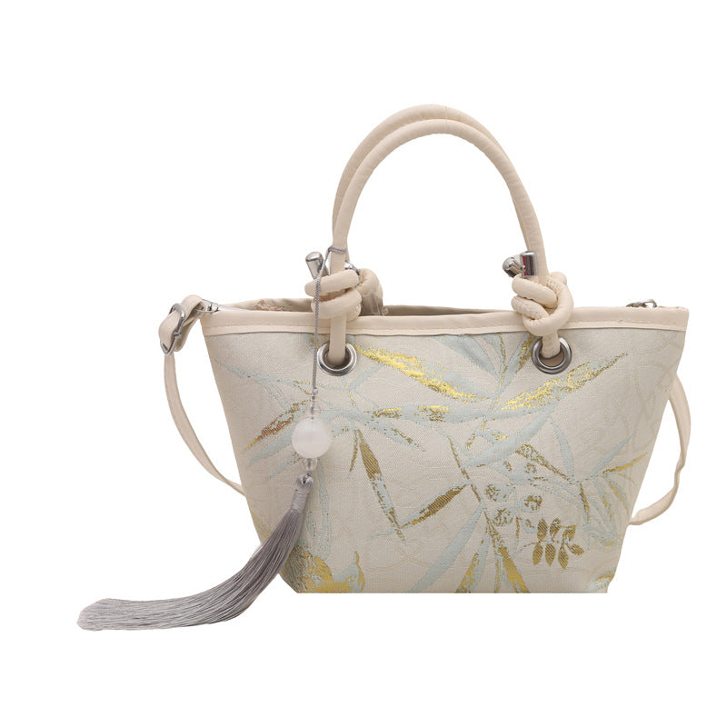 Damen elegante Umhängetasche mit floralem Design und kunstvollen Details Nord Taschen
