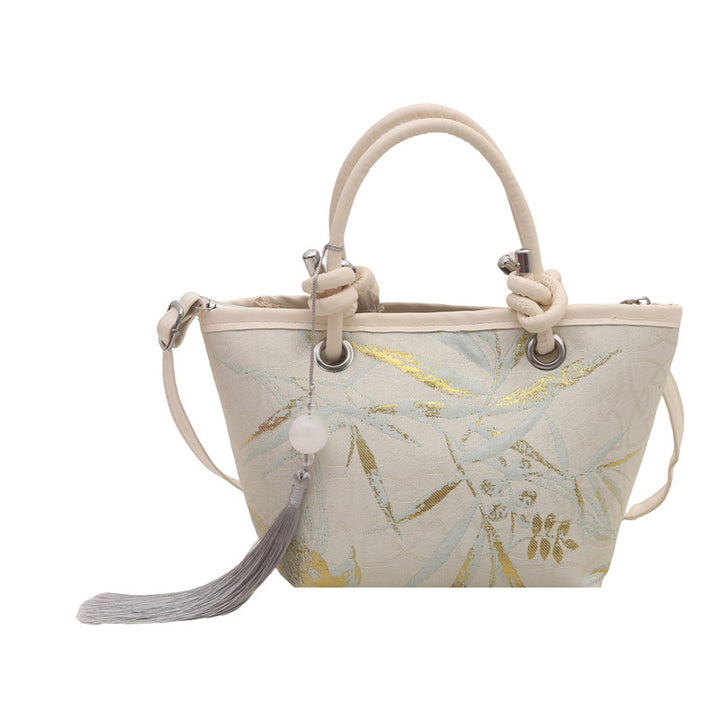 Damen elegante Umhängetasche mit floralem Design und kunstvollen Details Nord Taschen