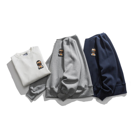 Unisex Oversize-Sweatshirt mit Raglanärmeln und Berg-Patch Nord Taschen