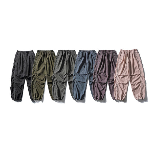 [Herren] weit geschnittene Nylon-Joggerhose im Utility-Stil mit Tunnelzugbund, Kontrastpaspel und elastischen Knöchelabschlüssen Nord Taschen
