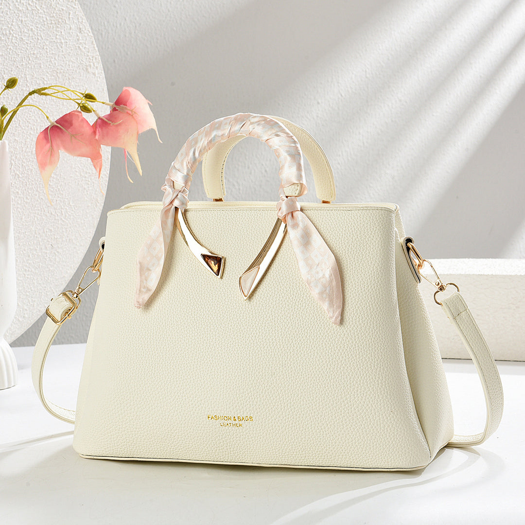 Damen elegante Handtasche mit dekorativer Schal-Applikation Nord Taschen
