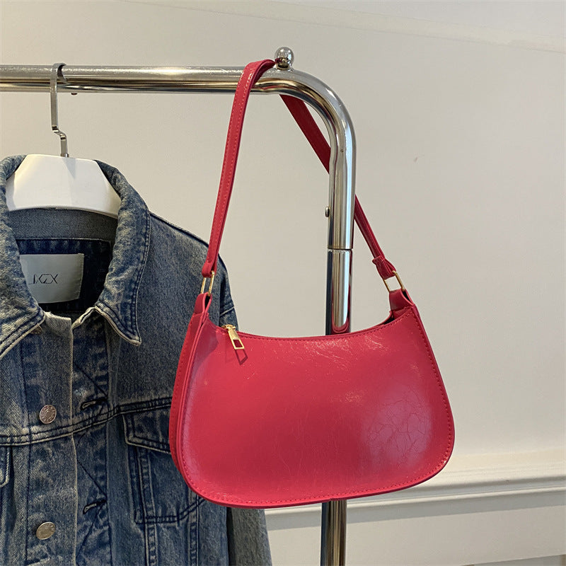 Damen elegante Umhängetasche aus veganem Leder mit minimalistischer Form Nord Taschen