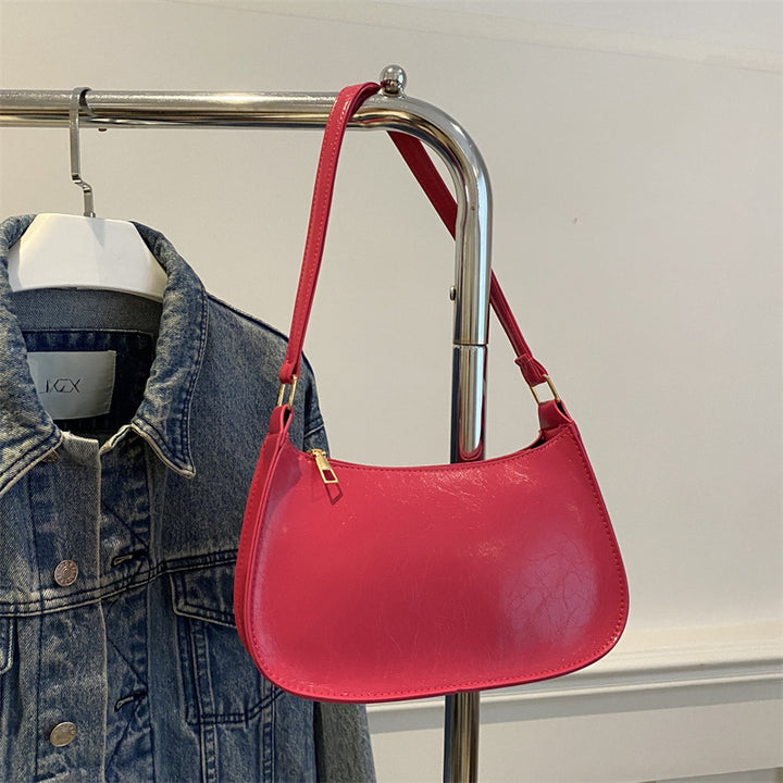 Damen elegante Umhängetasche aus veganem Leder mit minimalistischer Form Nord Taschen