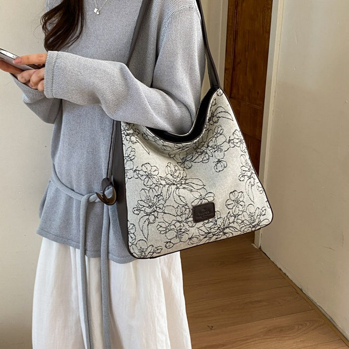 Damen Beuteltasche mit floralem Motiv und weichem Tragegriff Nord Taschen