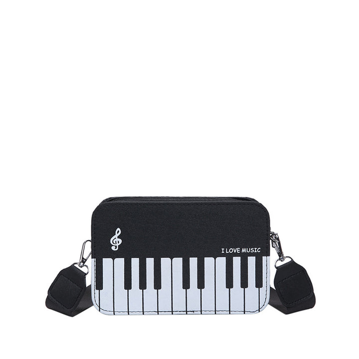 Damen Umhängetasche mit musikalischem Klaviertastendesign Nord Taschen