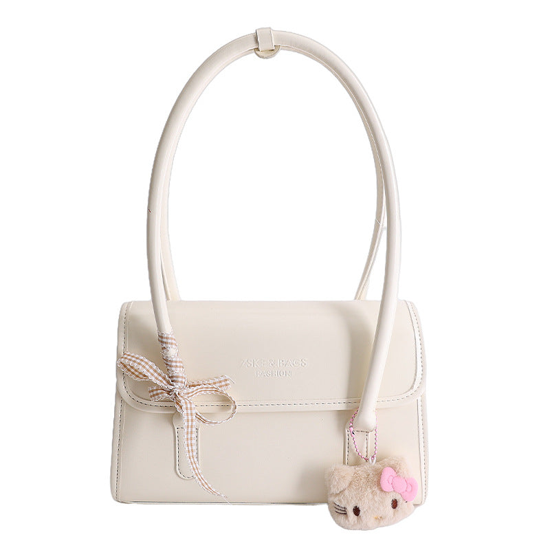 Damen elegante Handtasche mit verspieltem Stoffanhänger Nord Taschen