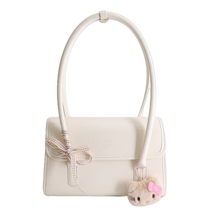 Damen elegante Handtasche mit verspieltem Stoffanhänger Nord Taschen
