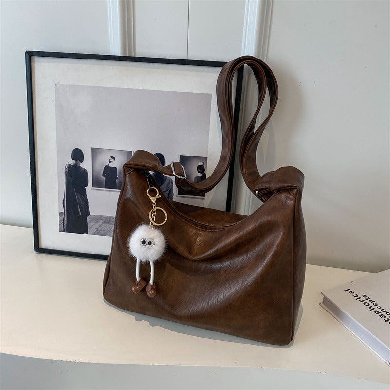 Damen Handtasche mit verspieltem Schlüsselanhänger Nord Taschen
