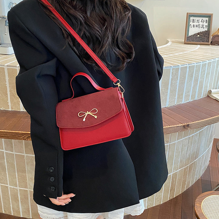 Damen elegante Umhängetasche mit Schmuckdetails Nord Taschen