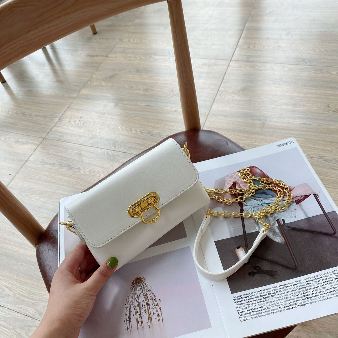 Damen Umhängetasche mit elegantem Kettenriemen und klappbarem Verschluss Nord Taschen